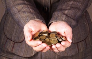 bigstockphoto_Money_In_The_Hands_6538805