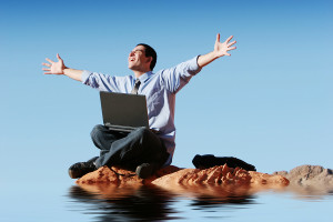 Young businessman working on his laptop