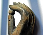 bigstockphoto_Hand_Of_The_Buddha_With_Pearl__1519326